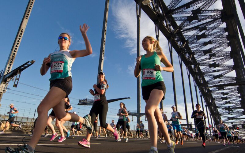 Happy runners doing the Sydney marathon